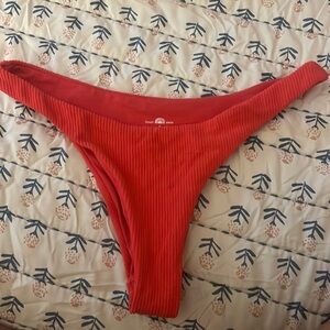 Red coral bathing suit bottoms, really cute for summer.